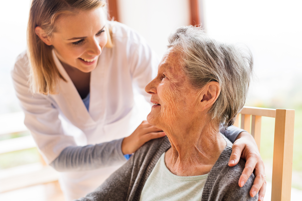 A young caregiver, providing personal care services