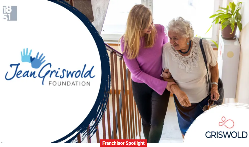 A younger woman in a lavender sweater assists an elderly woman on stairs, exemplifying the essence of caregiver services. The image features the Jean Griswold Foundation logo and a "Franchisor Spotlight" banner at the bottom.