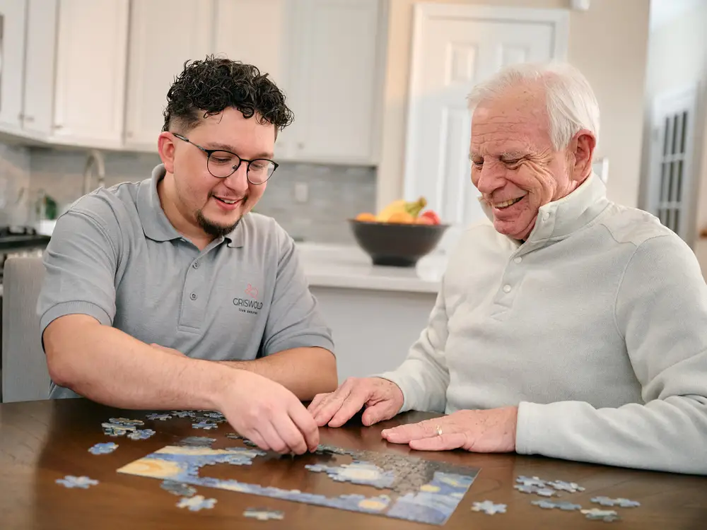 A younger man and an older man, connected through a care pairing program