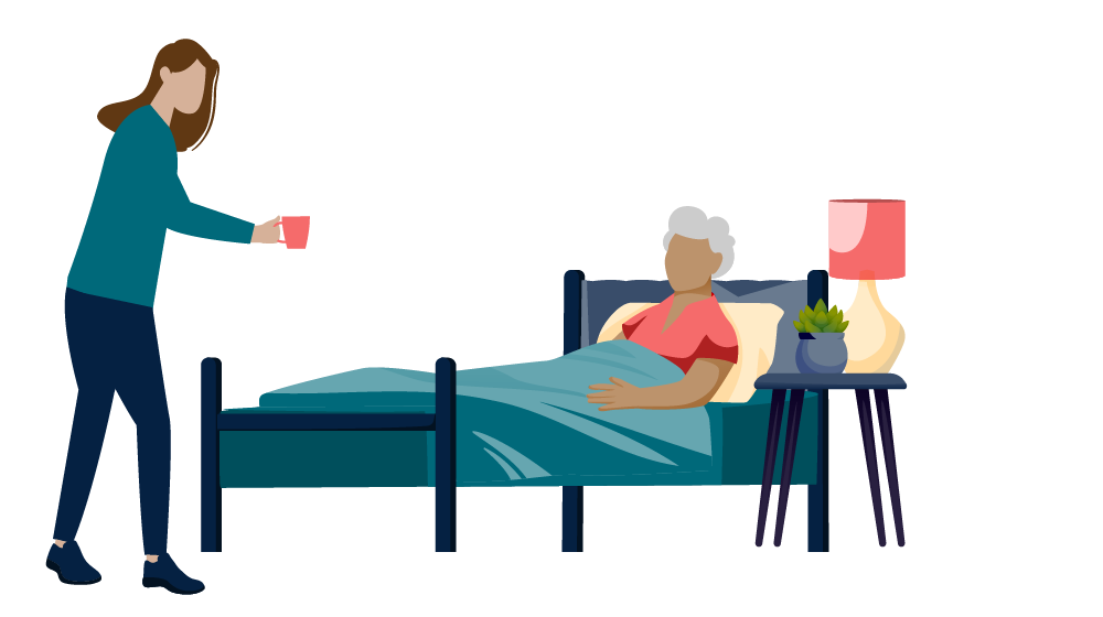 Person in a teal shirt offers a red mug to an elderly person resting in bed, next to a side table with a lamp and plant.